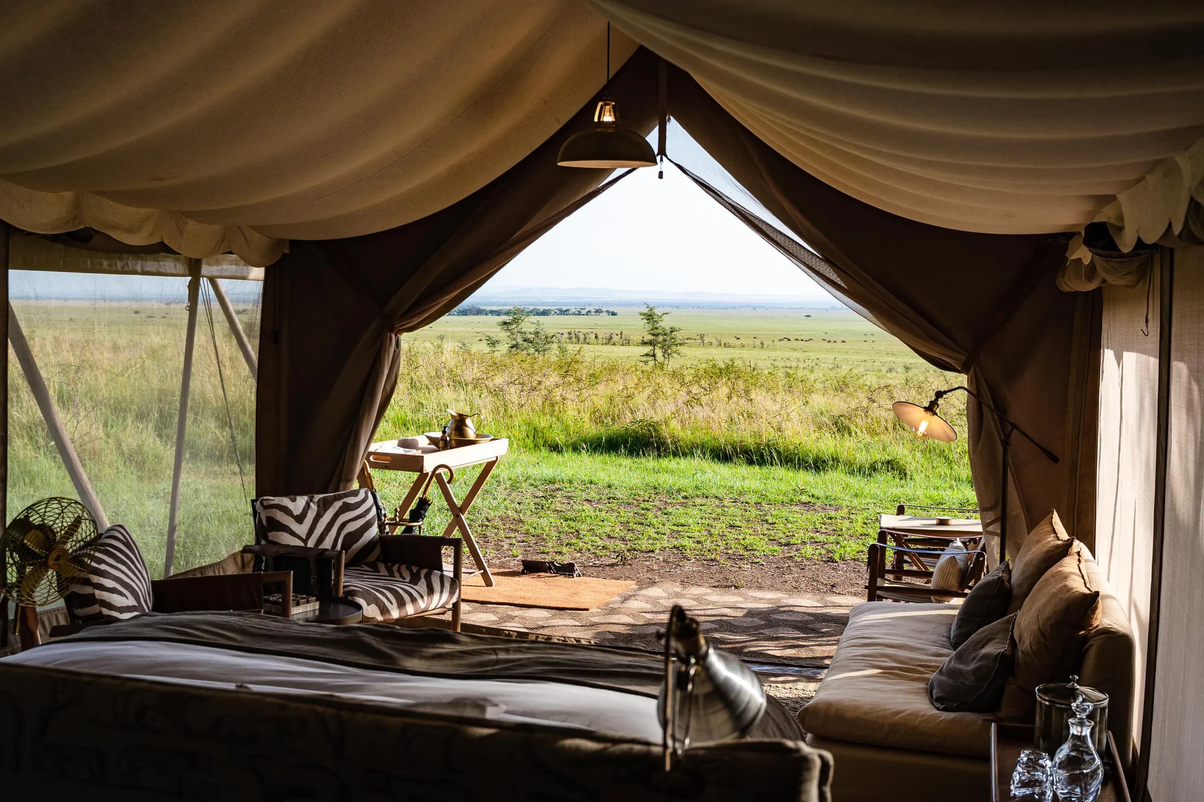 View from inside a safari tent out over the open plains