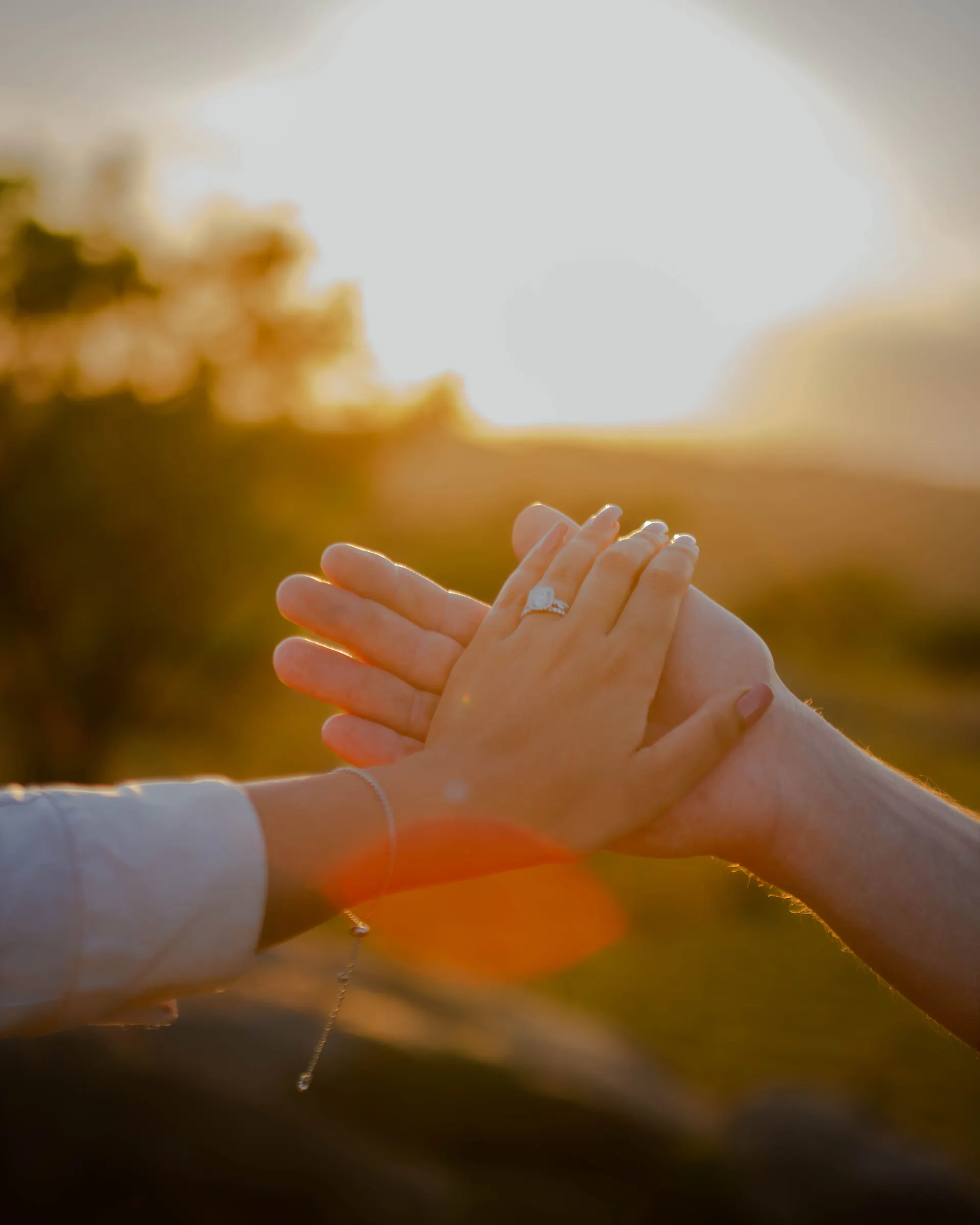 An engagement ring caught in the evening light